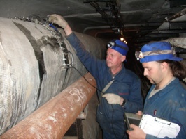 Heat lines inspection by the non-contact magnetometric method through the insulation layer performed by two experts